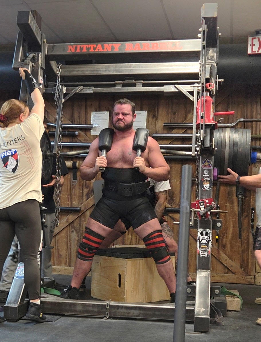 Bobby Lawson squatting